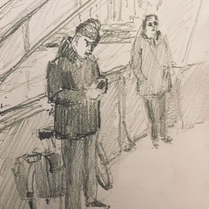 Op de pont 8 met muts en zonnebril